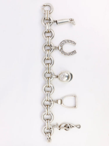Bracelet Gaétan de Percin (attribué à HERMES) - Bracelet en argent et breloques thème hippique 58 Facettes 896