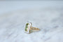 Bague Bague Belle Epoque Péridot entourage diamants 58 Facettes