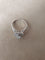 Bague Bague Or Blanc, 18 carats sertie d'un diamant central 58 Facettes