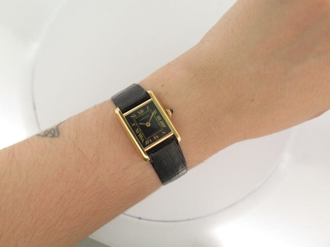 Montre vintage montre CARTIER tank pm 27 mm mecanique en or jaune 18k 58 Facettes 253144