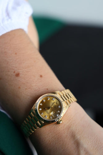 Montre Rolex Montre Oyster Perpetual Date Juste Or jaune Diamant 58 Facettes 1887742CN