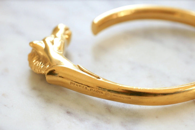 Bracelet Bracelet Hermès doré tête de cheval 58 Facettes