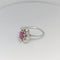 Bague Bague Marguerite en or blanc diamants et rubis 58 Facettes 16115