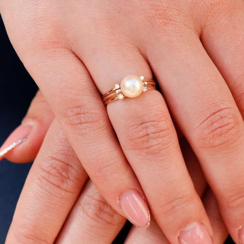 Bague Bague en or jaune diamants et perle 58 Facettes 18699