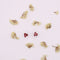 Boucles d'oreilles Boucle d’oreille clous en or jaune et trilogie rubis 58 Facettes