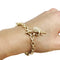 Bracelet Bracelet Cartier en or jaune, 6 breloques, diamants, émeraudes et rubis. 58 Facettes 30849/55