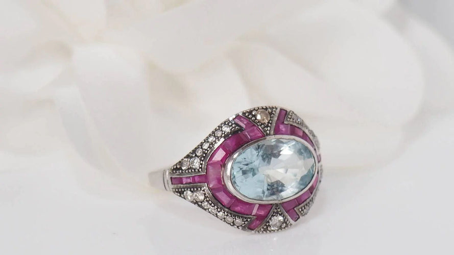 Bague Bague Art Déco or blanc et argent, aigue marine, rubis et diamants 58 Facettes 31442