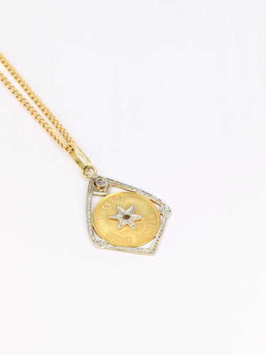 Pendentif Pendentif vintage en or et diamants 58 Facettes 752