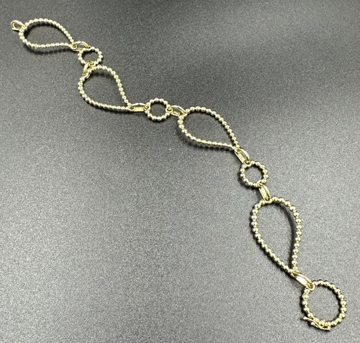 Bracelet BUCHERER. Bracelet Bubbles or jaune 18K 58 Facettes