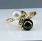 Bague 50.5 Bague en or jaune 18 carats, perle de Tahiti, perle de culture blanche et diamants 58 Facettes AB264
