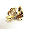 Broche Broche noeud diamants 58 Facettes