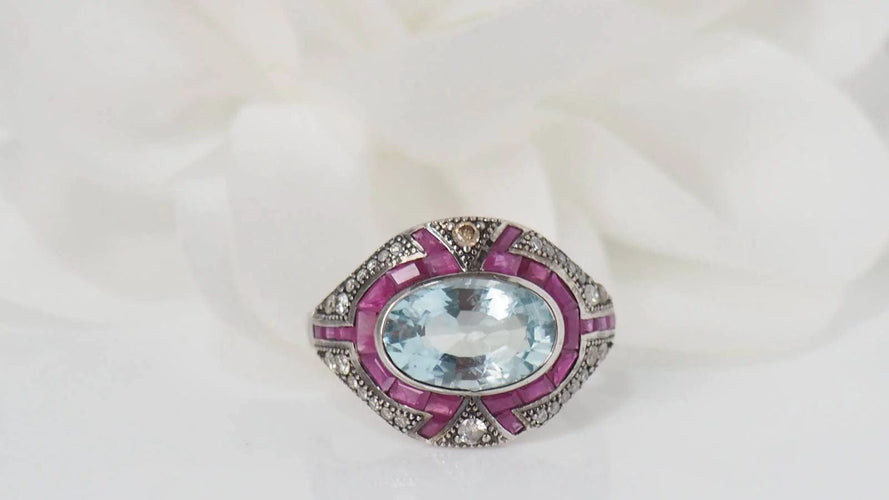 Bague Bague Art Déco or blanc et argent, aigue marine, rubis et diamants 58 Facettes 31442