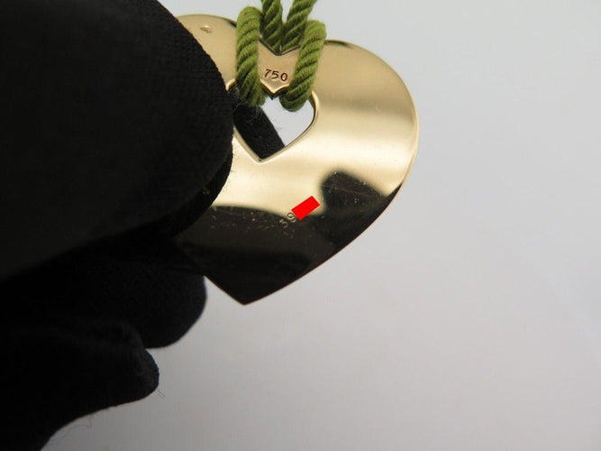 Pendentif pendentif coeur secret POIRAY or jaune 18k sur cordon 10.8gr 58 Facettes 253611
