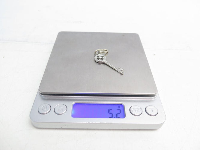 Collier collier pendentif TIFFANY & CO cle rosace platine diamants 58 Facettes 248507