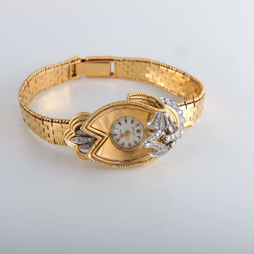 Montre Montre Rolex "dissimulée" or jaune diamants 58 Facettes 110.97
