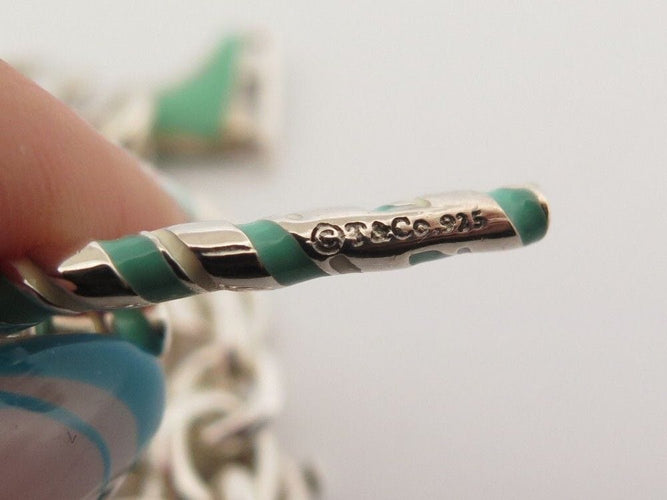 Bracelet bracelet TIFFANY & CO chaine a breloques charms 19 argent 58 Facettes 254453