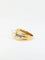 Bague Bague vintage en or jaune, perle et saphirs 58 Facettes 705