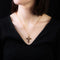 Pendentif Croix or jaune diamants grenats 58 Facettes 19-698B