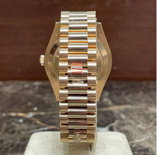 Montre ROLEX - MONTRE DAY DATE II OR ROSE 41 mm RUBIS ET DIAMANTS 58 Facettes RÉF 10008/23