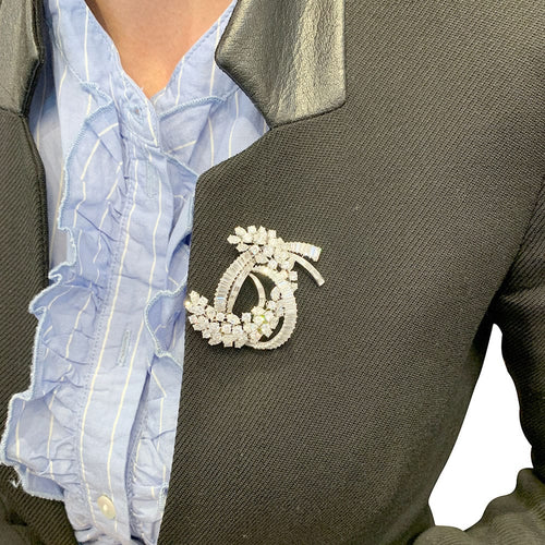 Broche Broche "Volute" en platine or blanc, diamants. 58 Facettes 31490