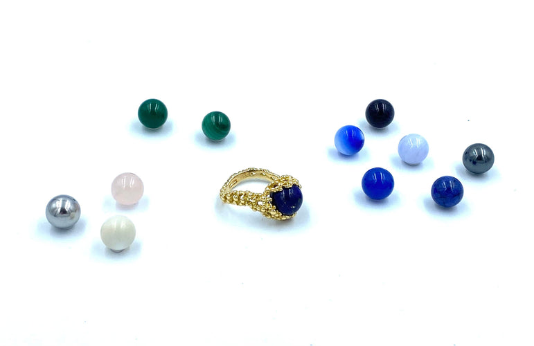 Bague Gilbert Albert. Belle bague Mimosas or jaune et billes interchangeables 58 Facettes