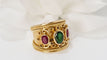Bague 53 Bague jonc ruban en or jaune rubis et pierre verte 58 Facettes 32035