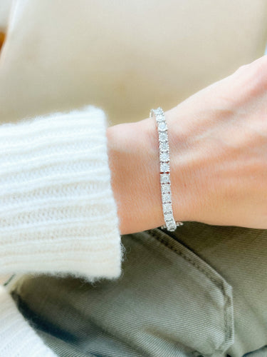 Bracelet Bracelet rivière et or gris orné de diamant 58 Facettes 1