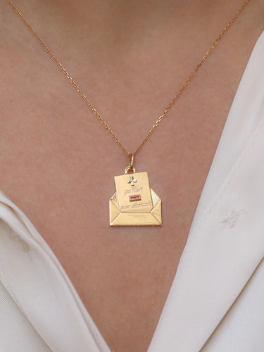 Pendentif Médaille Augis lettre d’amour Plus qu’hier moins que demain 58 Facettes 921
