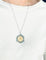 Pendentif Médaille ajourée en or gris et diamant représentent la vierge et l'enfant 58 Facettes