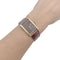 Montre Montre Cartier "Tank Must" argent plaqué or, cadran laqué marron. 58 Facettes 33541