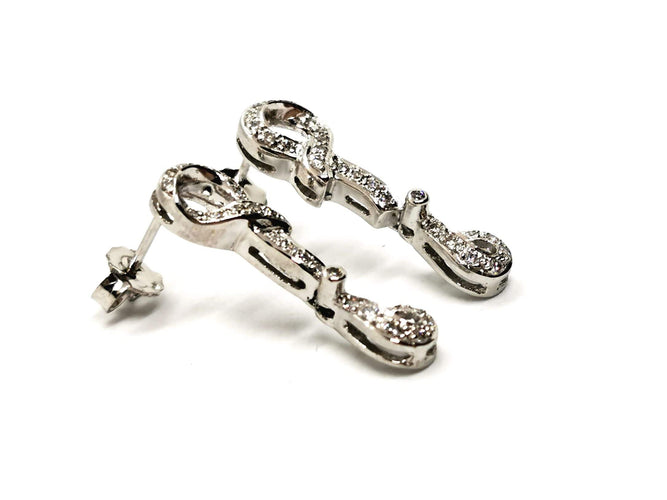 Boucles d'oreilles Boucles d'oreilles Pendantes Or blanc Diamant 58 Facettes 1523674CN