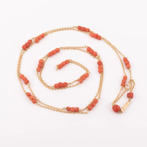 Collier Sautoir en or jaune et  boules de corail facettés 58 Facettes