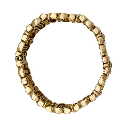 Bracelet Bracelet Boucheron en or jaune, rubis et diamants. 58 Facettes 31013