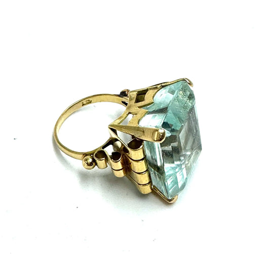 Bague Énorme bague aigue-marine de 35 ct, taille émeraude. 58 Facettes