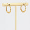 Boucles d'oreilles Créoles or jaune torsadées 58 Facettes 19-456D