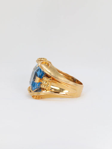 Bague Bague cocktail vintage en or et pierre bleue 58 Facettes 725