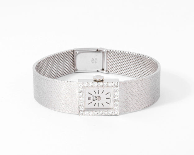 Montre Montre Tissot or gris et diamant 58 Facettes 0