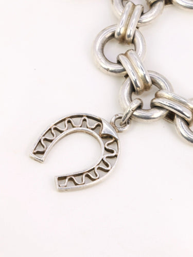 Bracelet Gaétan de Percin (attribué à HERMES) - Bracelet en argent et breloques thème hippique 58 Facettes 896