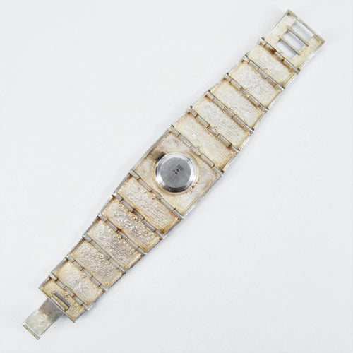 Montre Montre vintage en argent texturé 58 Facettes 22-132