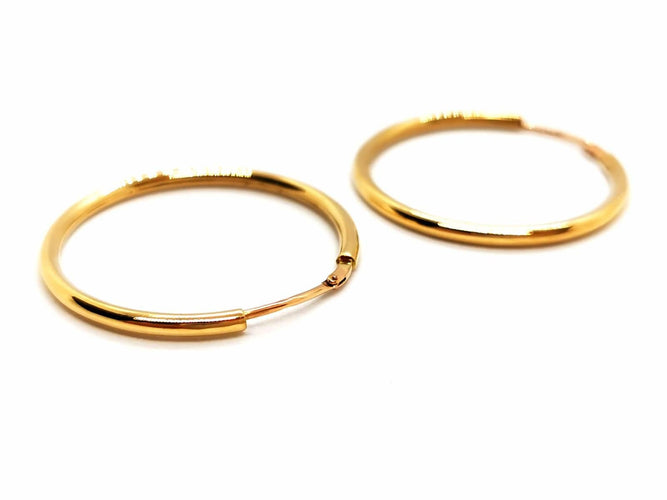 Boucles d'oreilles Boucles d'oreilles Créoles Or jaune 58 Facettes 1732456CN