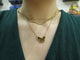 Collier collier van cleef &  arpels lucky alhambra or jaune oeil de tigre 58 Facettes 251004