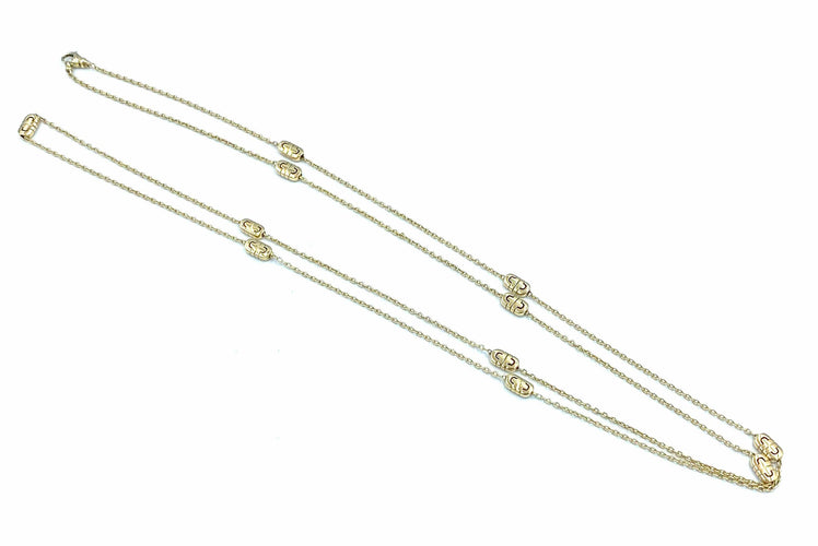Collier BVLGARI. Sautoir Parentesi or jaune 18K 58 Facettes