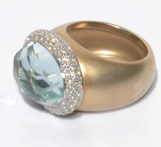 Bague Bague or rose sablé Pomellato une aigue marine 58 Facettes
