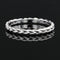 Bague 50 Alliance tresse ciselée or blanc 58 Facettes TRE2.0B