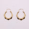 Boucles d'oreilles Créoles en or jaune 58 Facettes