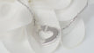 Collier Collier Cartier Symboles cœur en or blanc 58 Facettes