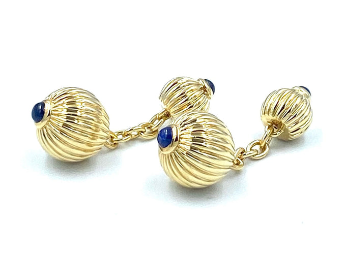 Boutons de manchette CARTIER. Boutons de manchette or jaune et saphirs 58 Facettes