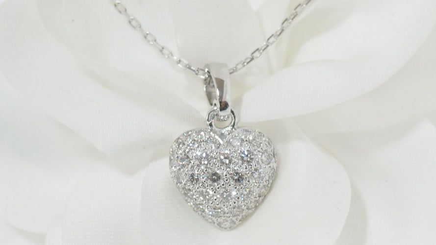 Collier Collier Cartier pendentif cœur, or blanc et diamants 58 Facettes 13807