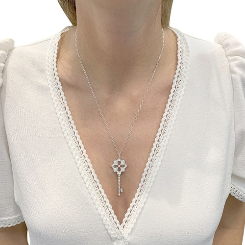 Collier Collier Tiffany & Co, "Clé", en platine, or blanc et diamants. 58 Facettes 33064