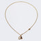 Collier Sautoir ancien en or accompagné de son médaillon, son pompon et son coulant 58 Facettes 17-076